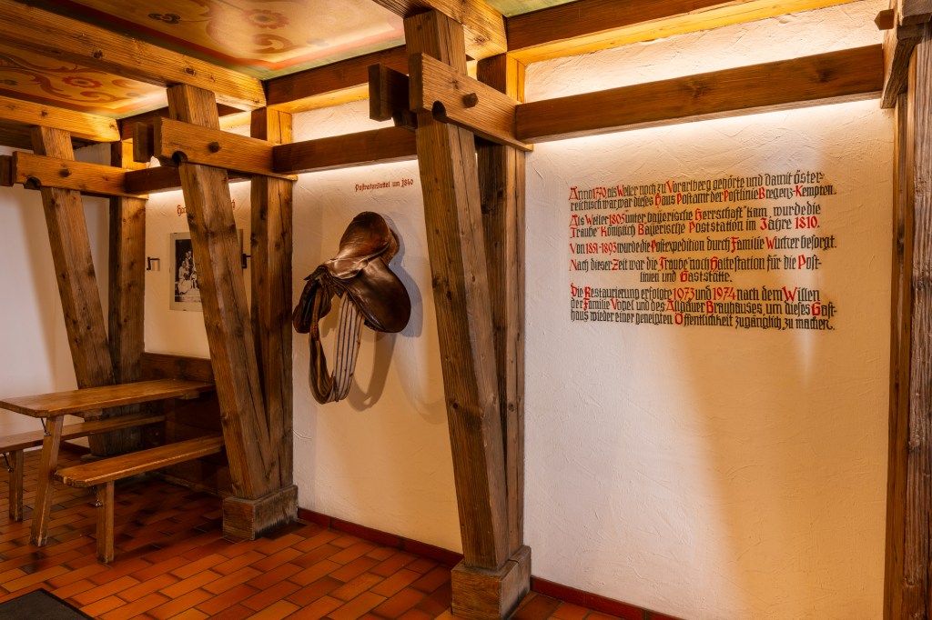 Historischer, malerischer Schriftzug der Geschichte vom Gasthaus zur Traube